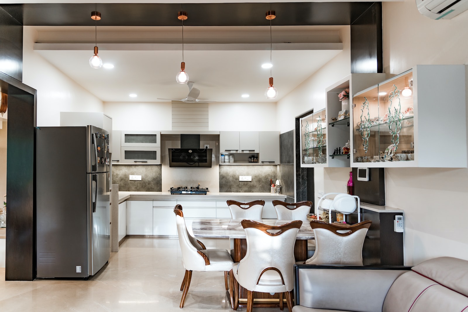 white and brown dining table and chairs